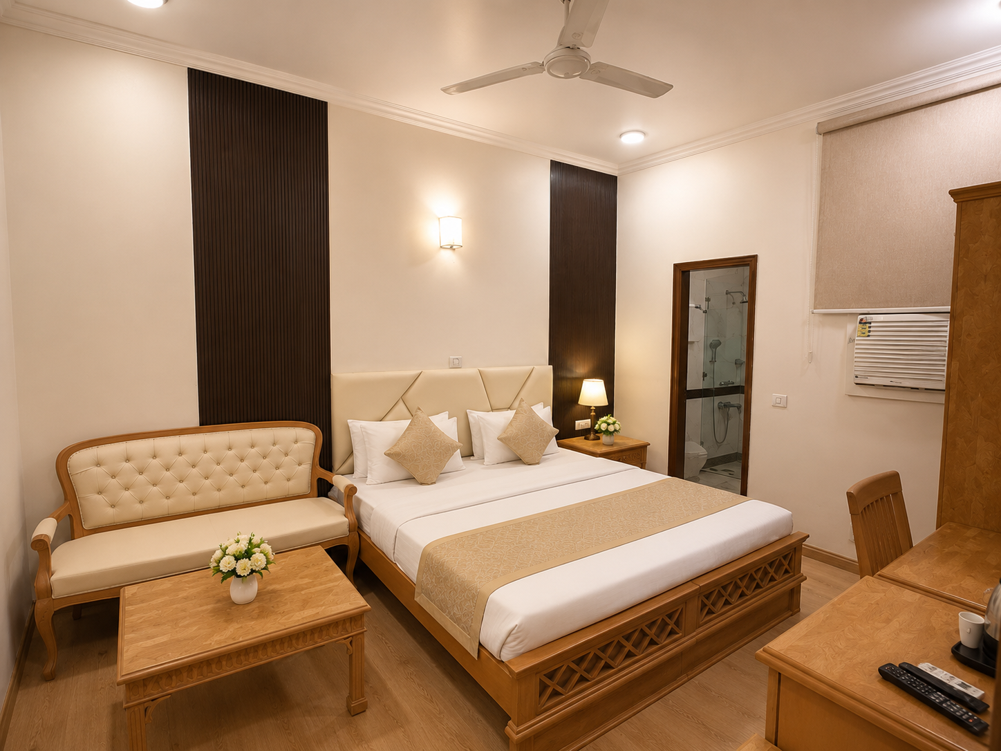 Hotel Ambica Palace — comfortable room with wardrobe and dressing table