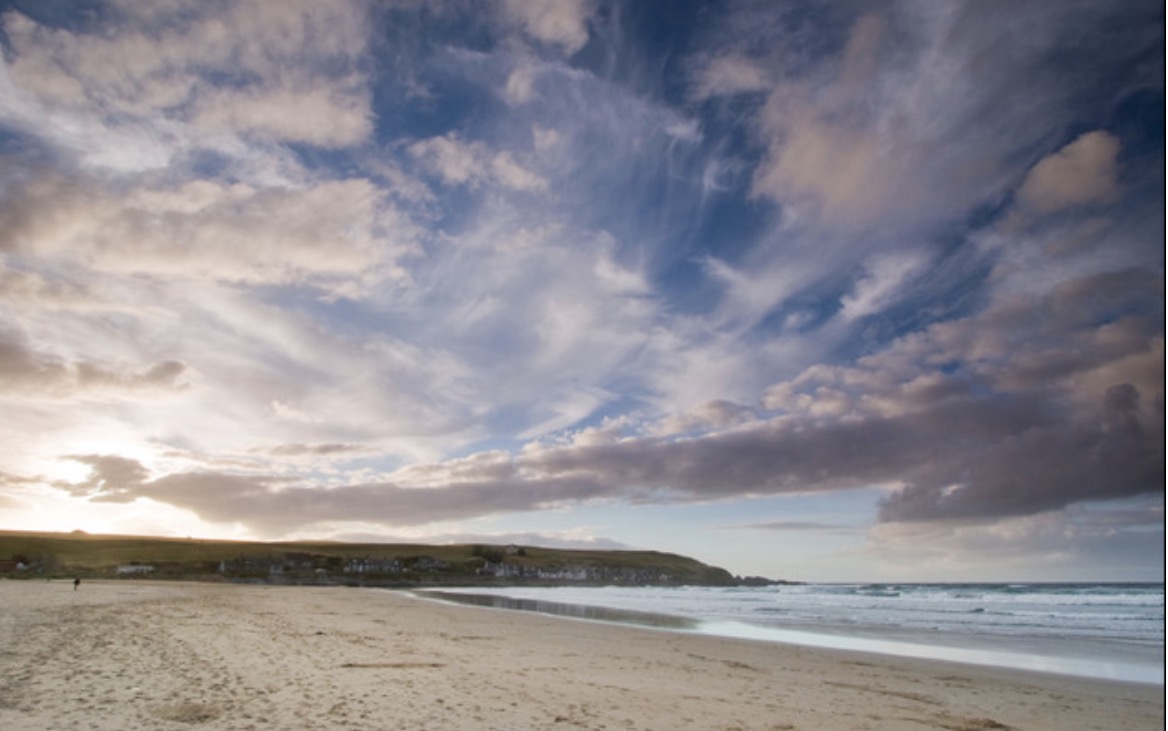 Sandend Bay, Scotland — village cottages along the shore at sunset