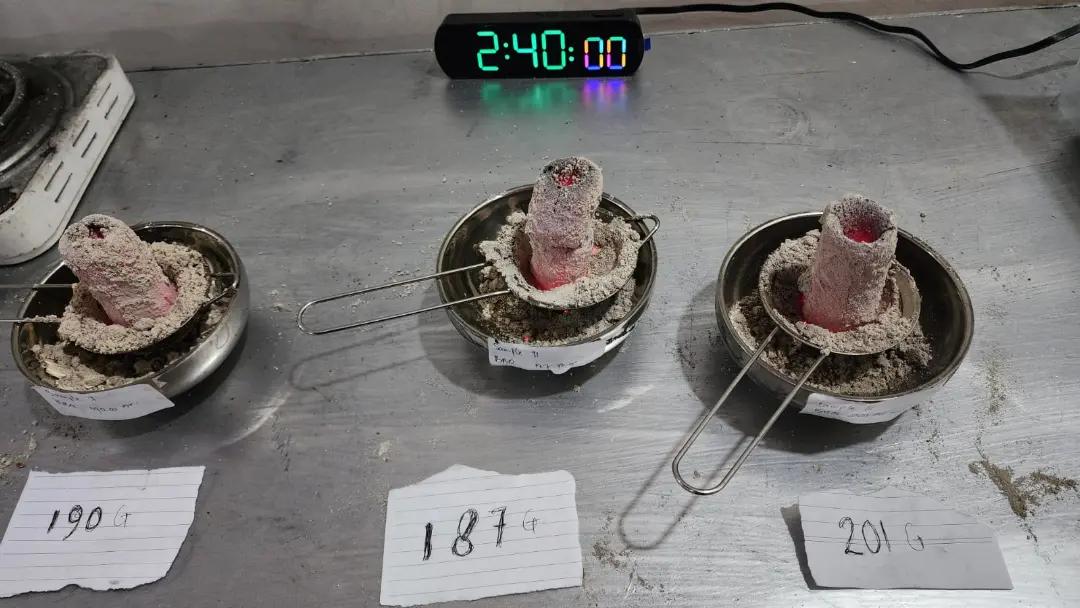 Charcoal briquettes during a burn-duration test