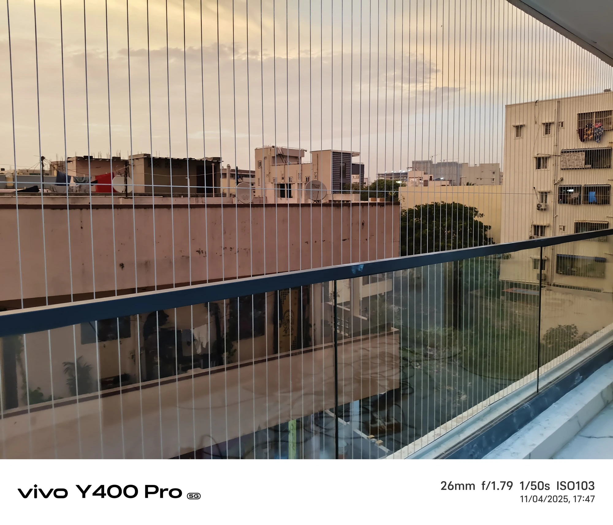 Invisible grills installed on a Hyderabad apartment balcony
