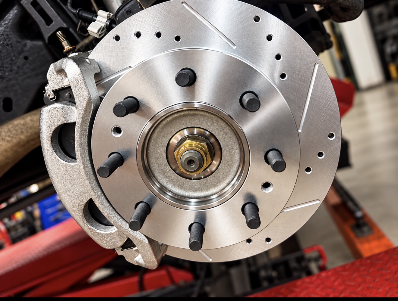 New drilled and slotted brake rotor installed