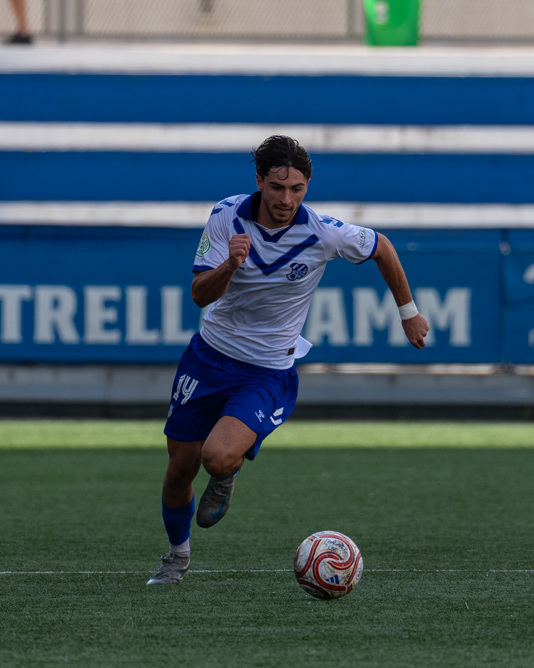 Aerial duel — striker rising to win the header