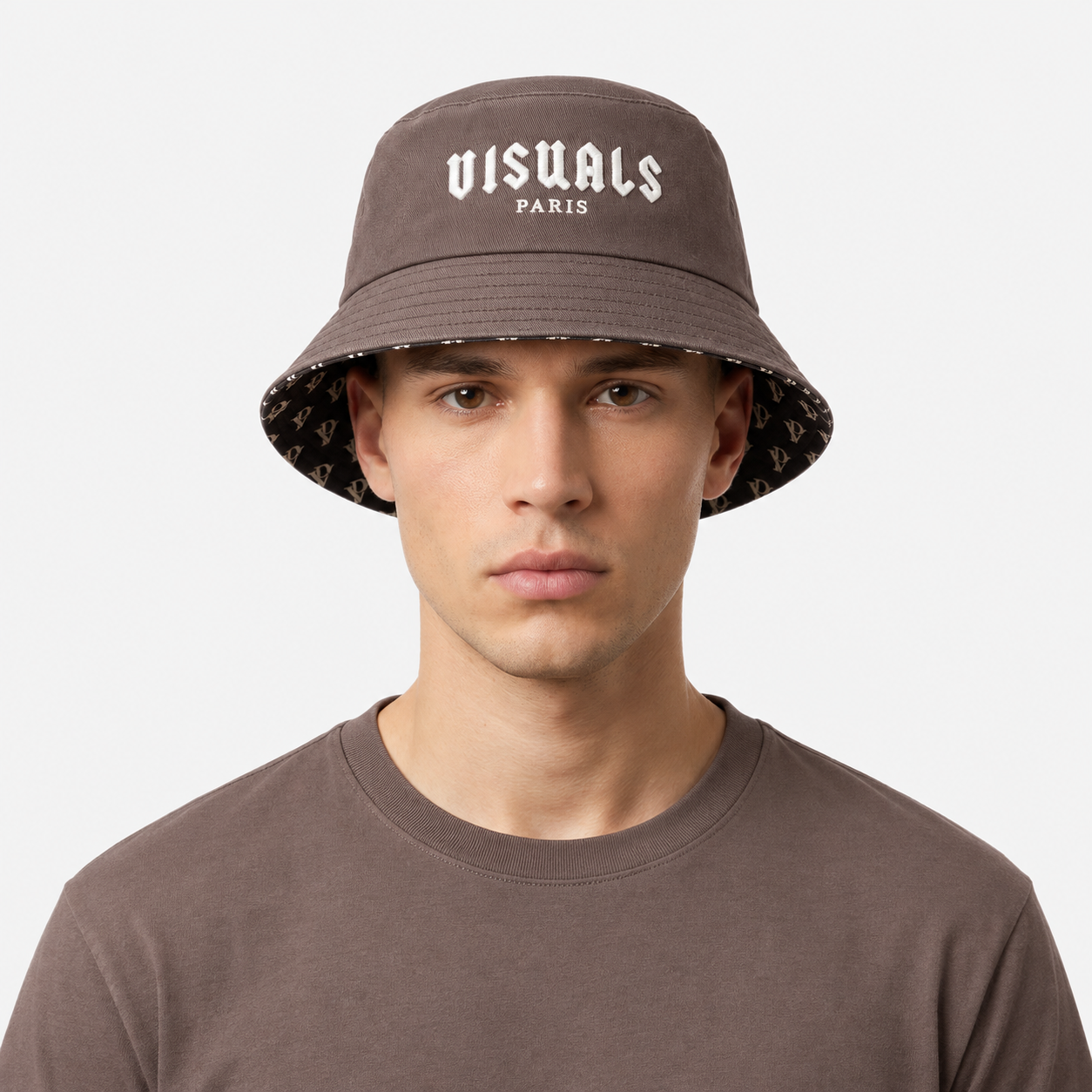 Monogram Reversible Bucket Hat — Taupe in Taupe — worn by a model