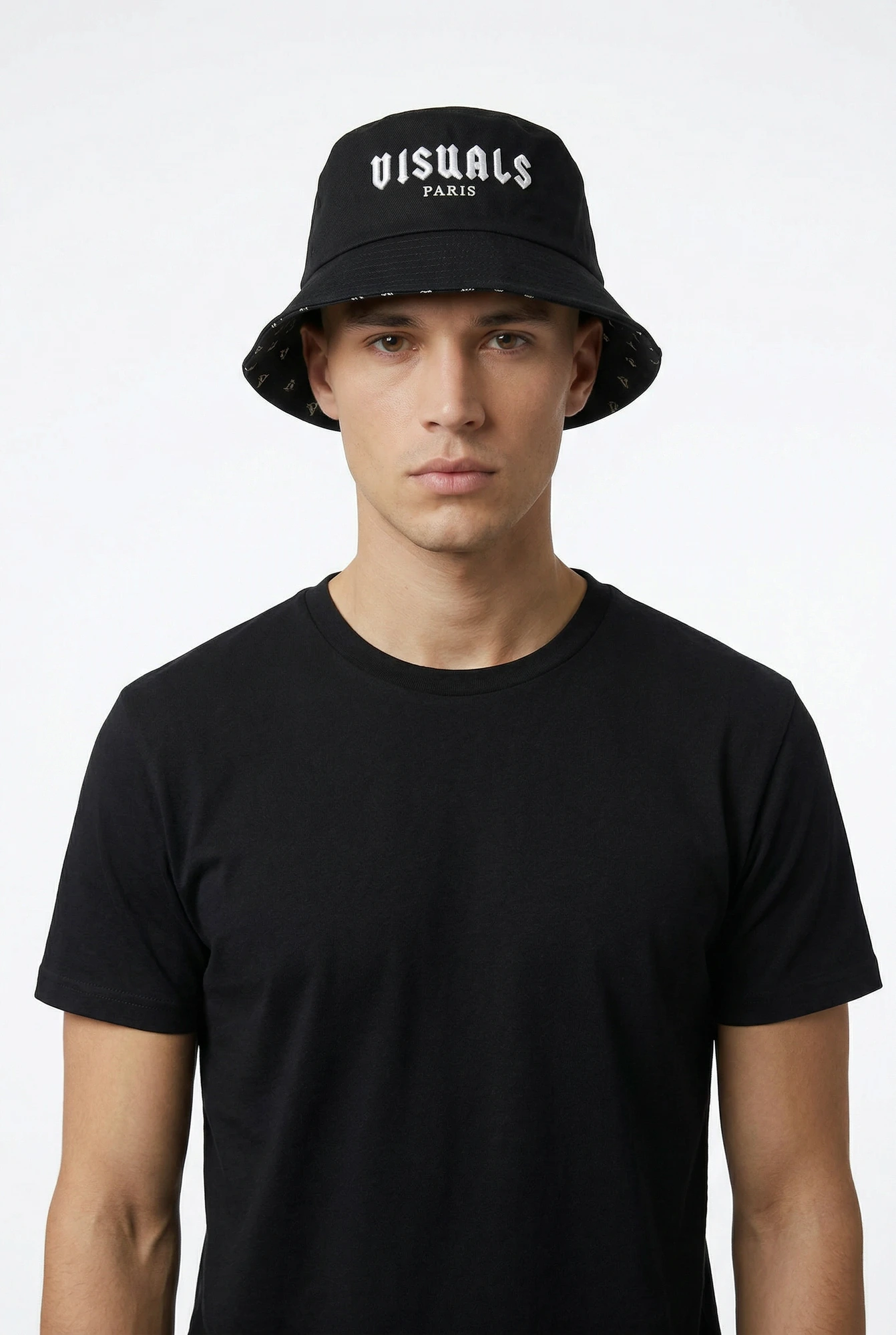Monogram Reversible Bucket Hat — Noir in Noir — worn by a model